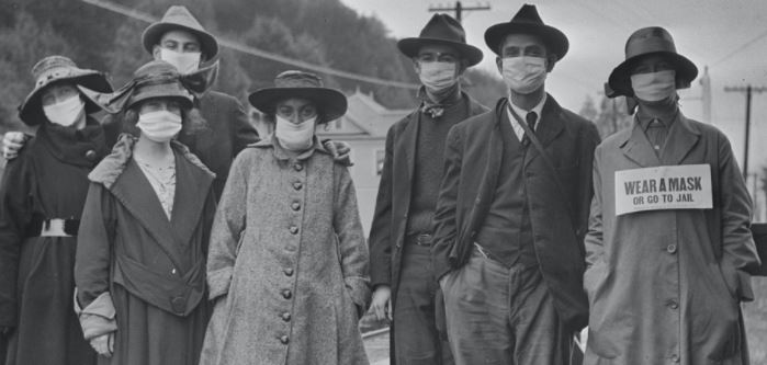 Historical photo — mask-wearing during the 1918 influenza pandemic